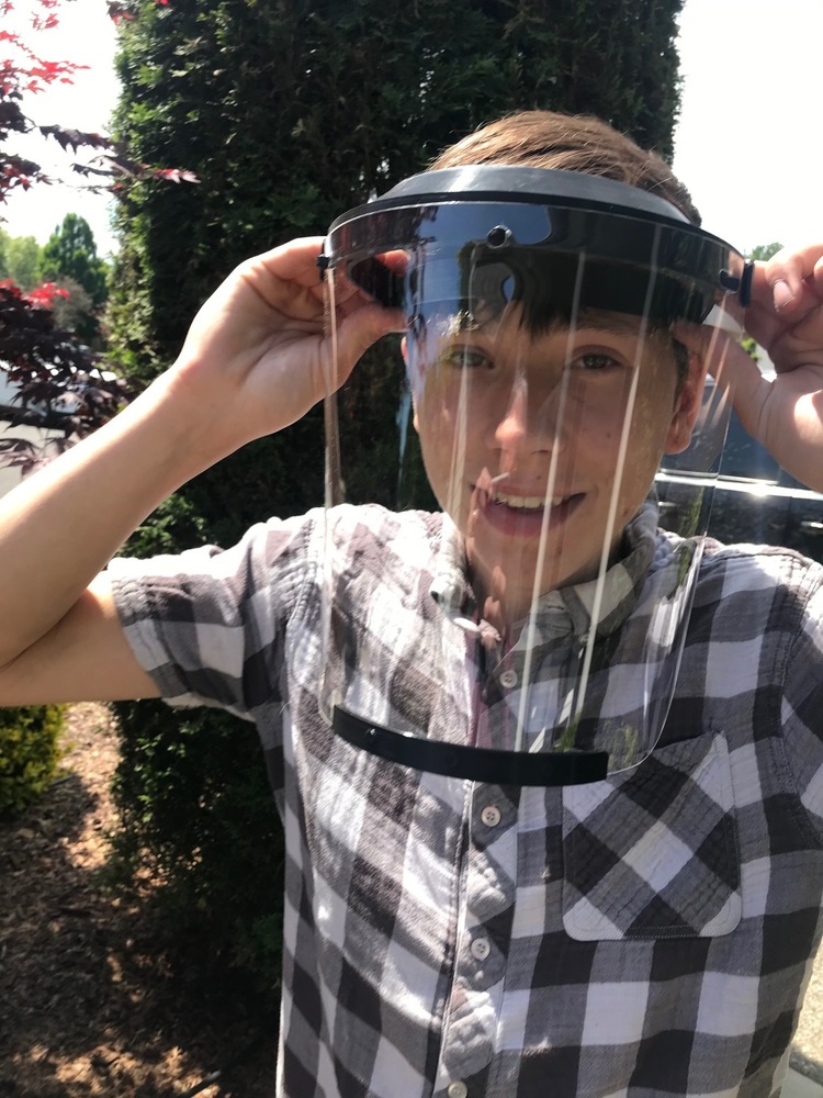 Senior Garrett Green with a Dream Lab 3D Printed Face Shield