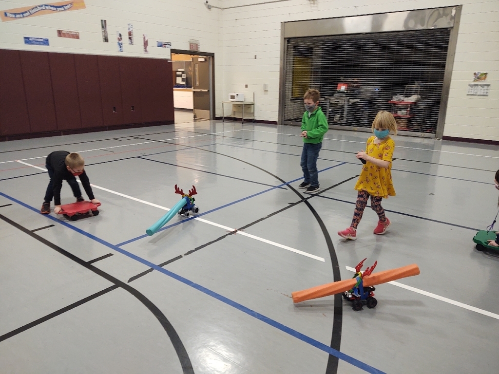 We are getting creative and having fun in PE! Today we played Reindeer Tag on scooters with remote control cars!
