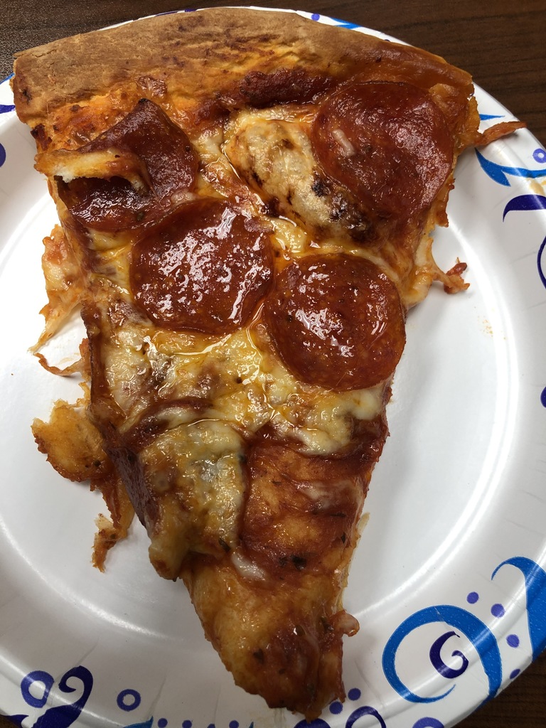 Students made pizza in foods and nutrition today.