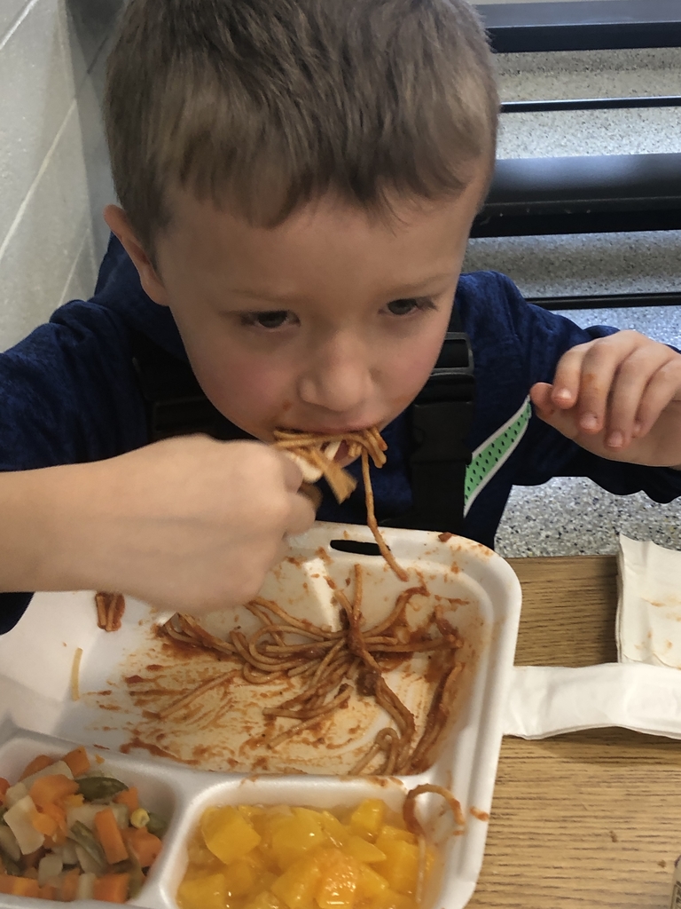 Tayden eating spaghetti