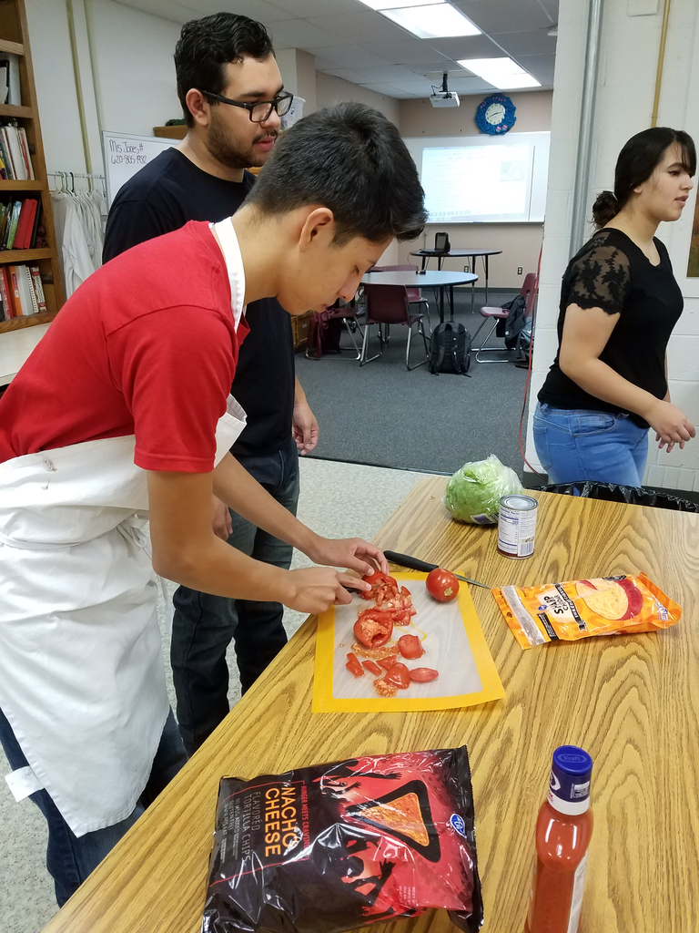 Slicing tomatoes.