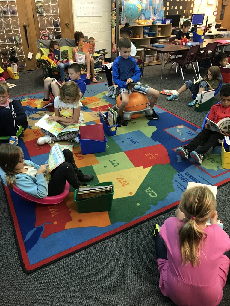 Students reading in carpet 