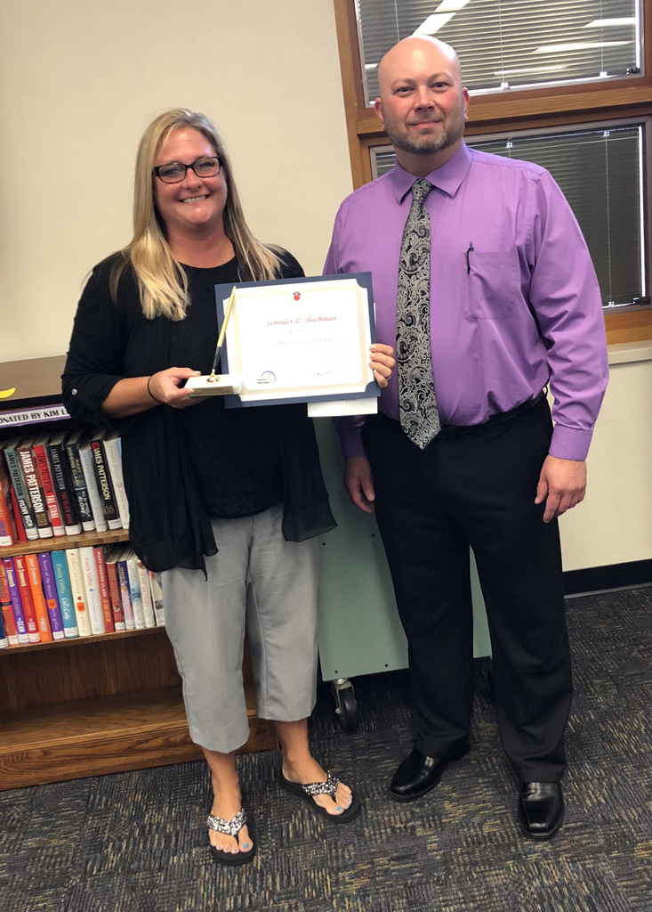 Mrs. Bachman receiving her KSDE 2019 TOY district nominee certificate and pen.