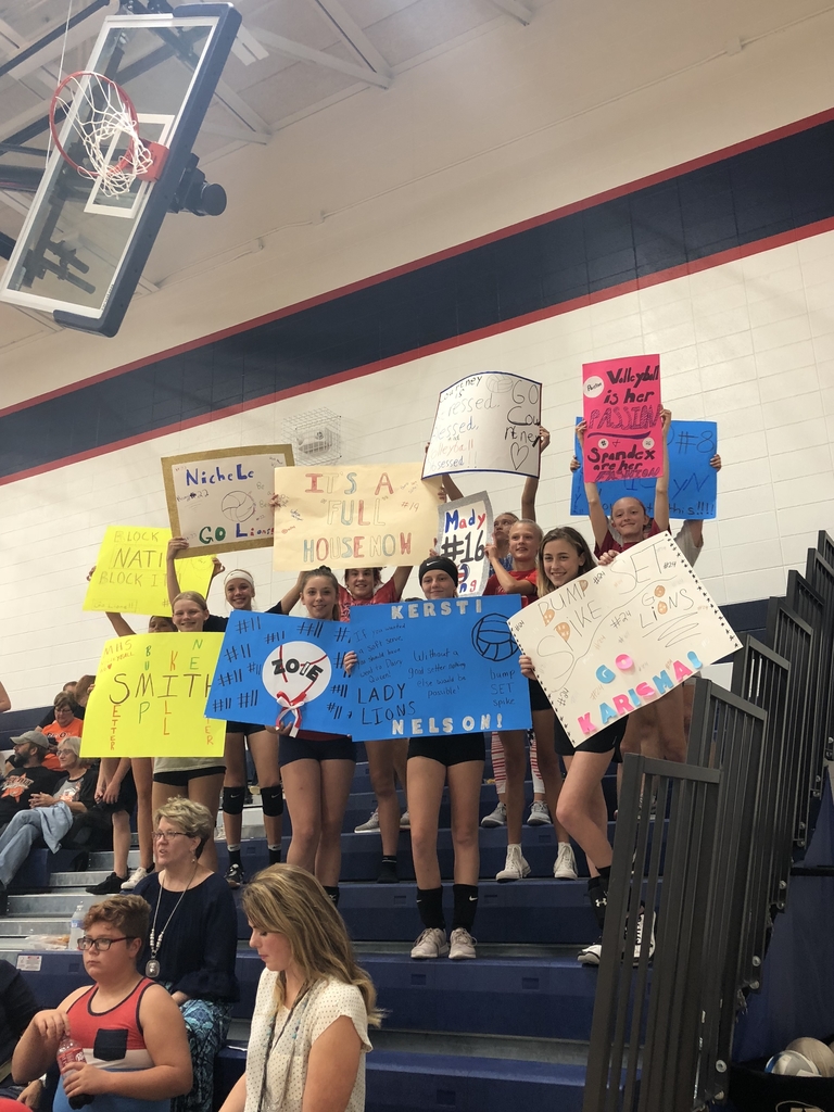 Signs for their high school buddies.