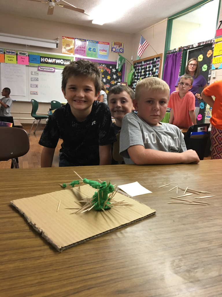 Kids with toothpick tower