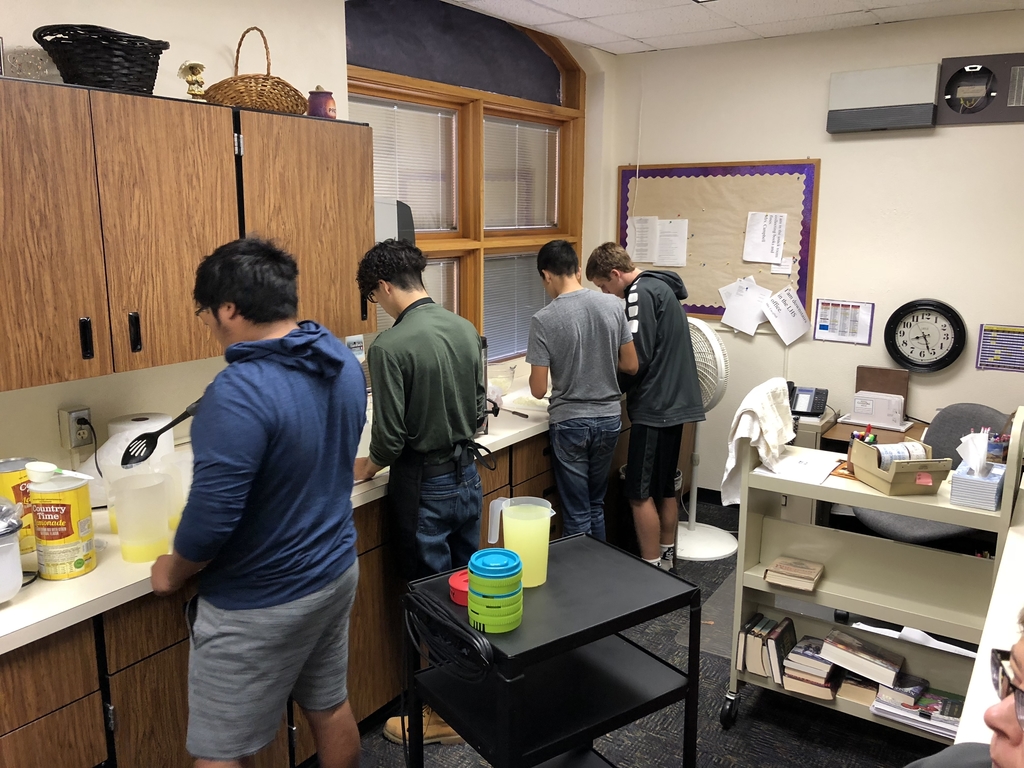 The four boys are hard at work.