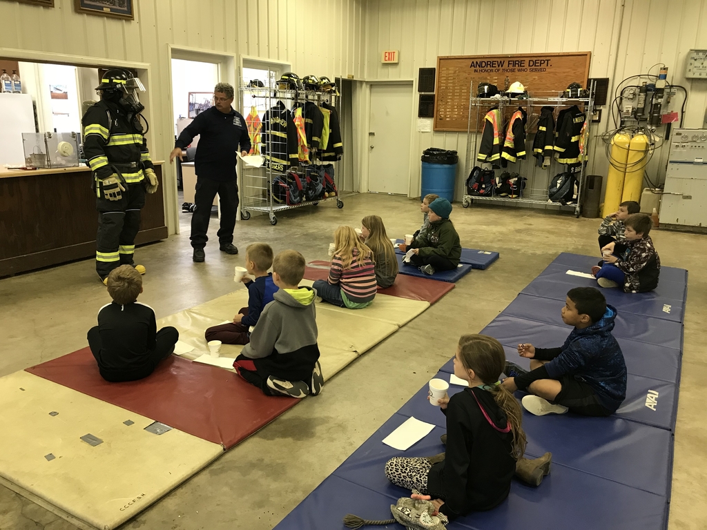 Learning about the firemen’s gear. 