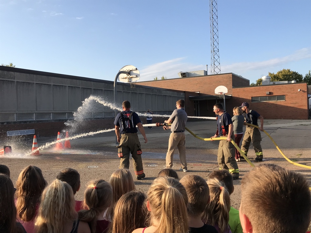 Mr. Ferguson and Mrs. Read try using the fire hoses.