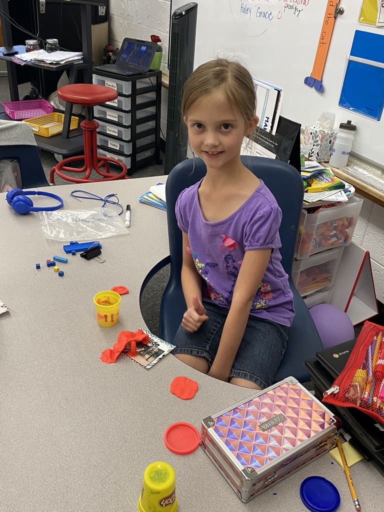 student 1 with play-dough