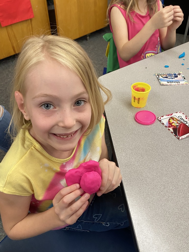 student 2 with play-dough