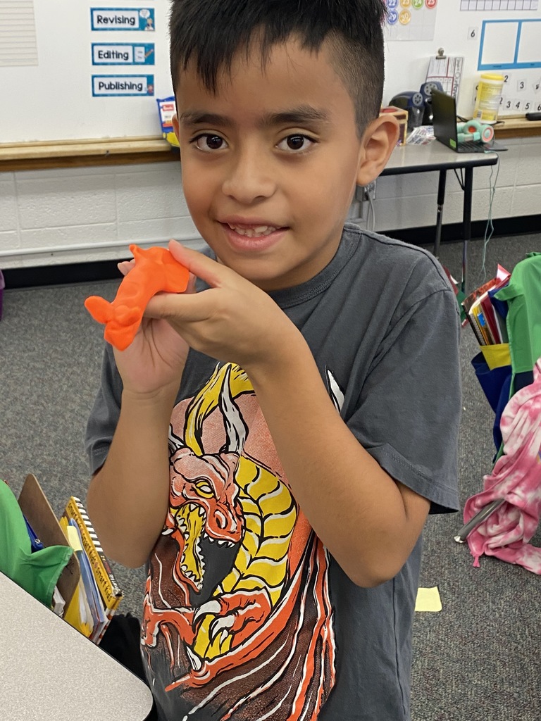 boy two with playdough creation