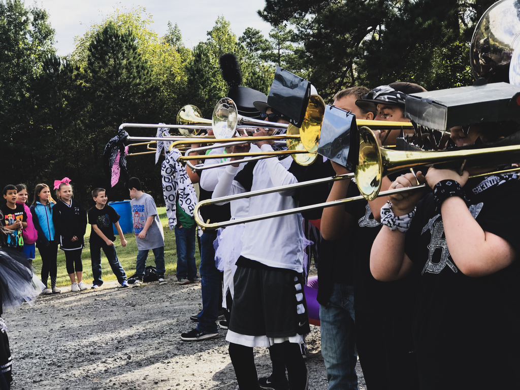 Students watch as the Bauxite High School Band pump up the crowd.