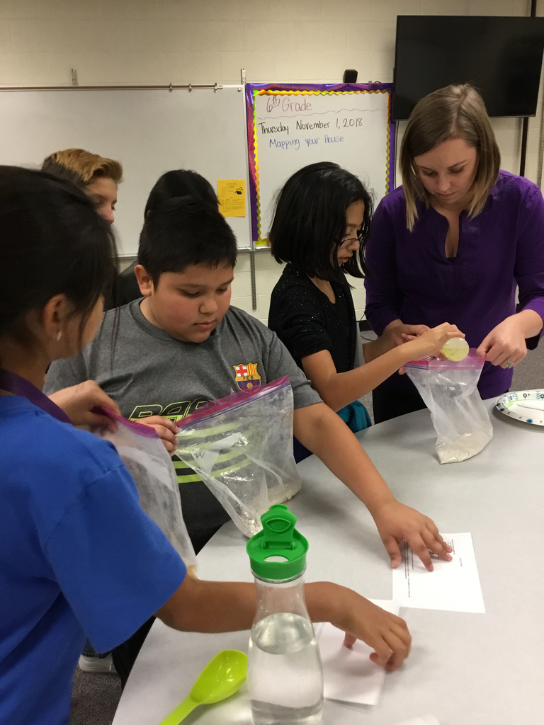 Mrs. Baca, Devine, Diego & Jordan M. measuring out their ingredients