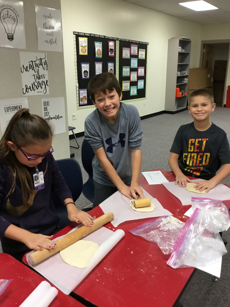 Ari, Quincy & Adriel rolling out their dough