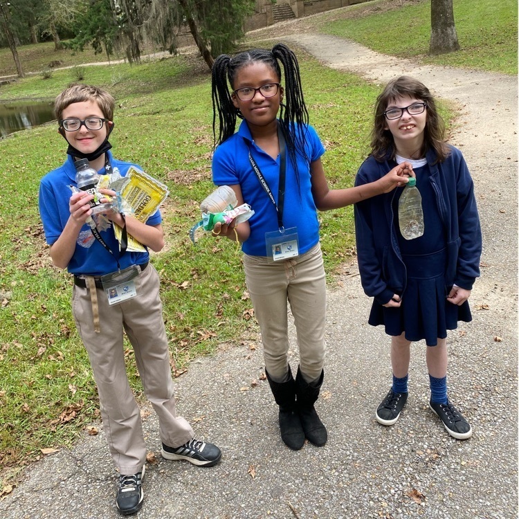 Students use their break time to pick up litter around campus