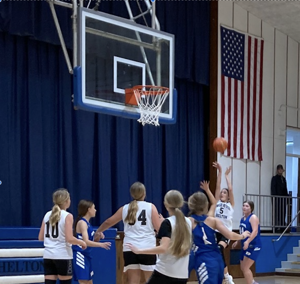 Lainey Paulk makes a big basket in the B game.