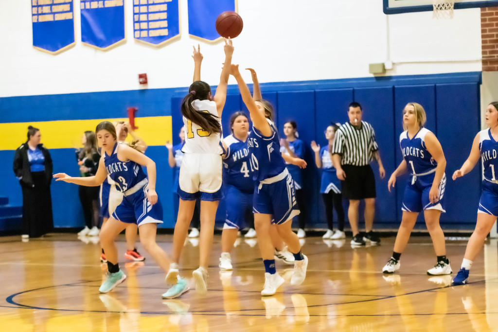 girl shoots from free throw line