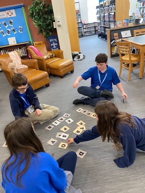 Club Read members play Scrabble Scramble.