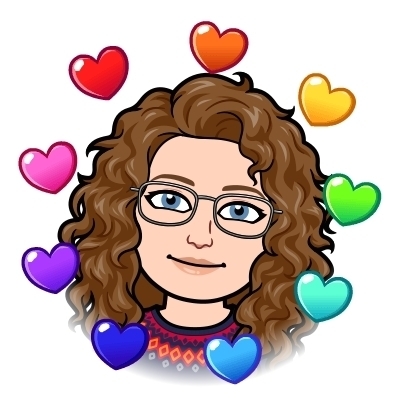 Cartoon of Ms. Pointer with rainbow hearts circling her face