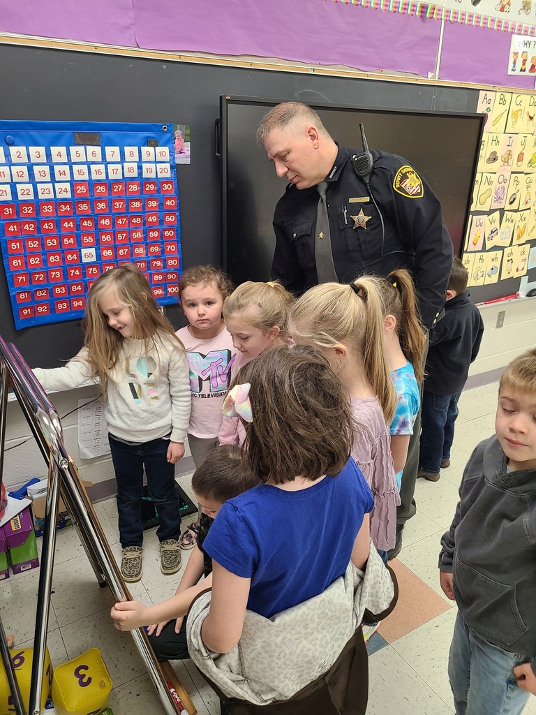 reading the morning message to Deputy Hurst
