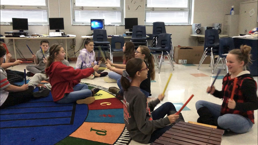 Students with instruments  