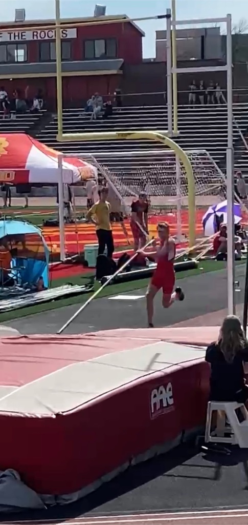 Heath Hawkins vaulting 13'-8”