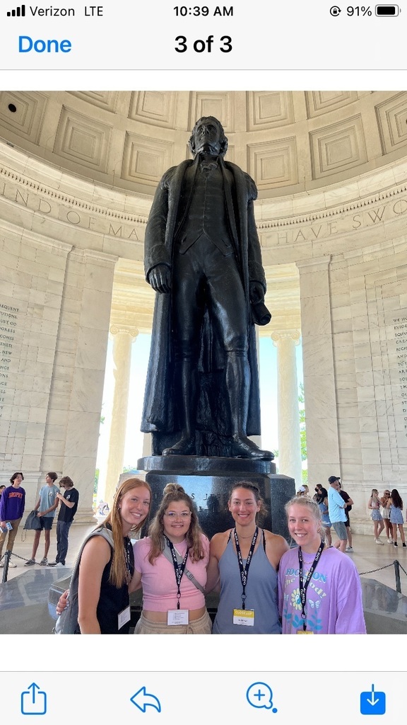 stood engaged in learning at a walking workshop Jefferson memorial