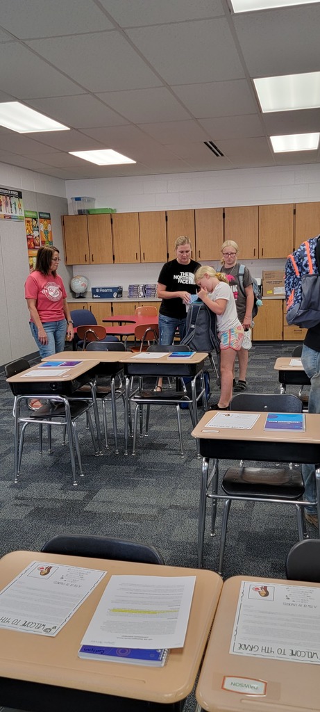 students looking at classroom