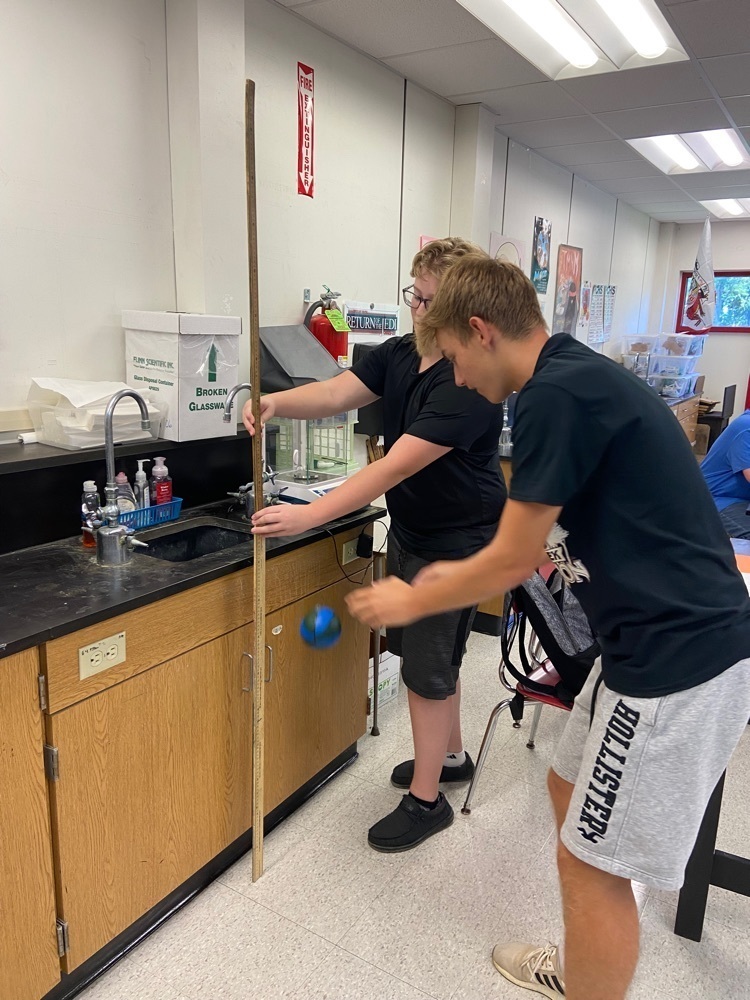 AP Physics performing a lab to determine bounce height.