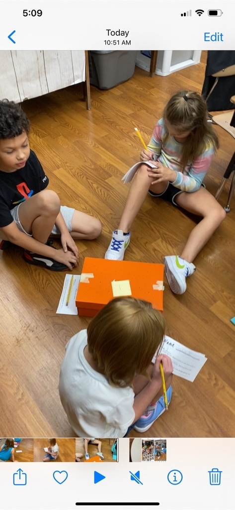 students investigating box