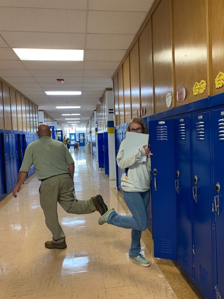 mr. weilert in the hallway with student