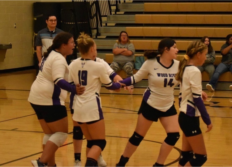 C players come together for a side out