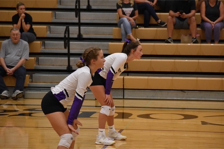 Kaitlyn Johnson and Kenna Wagoner get ready to serve receive during JH VB matches