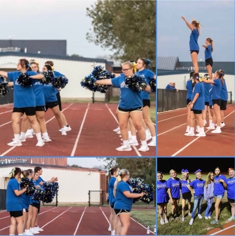 cheerleaders perform at home game