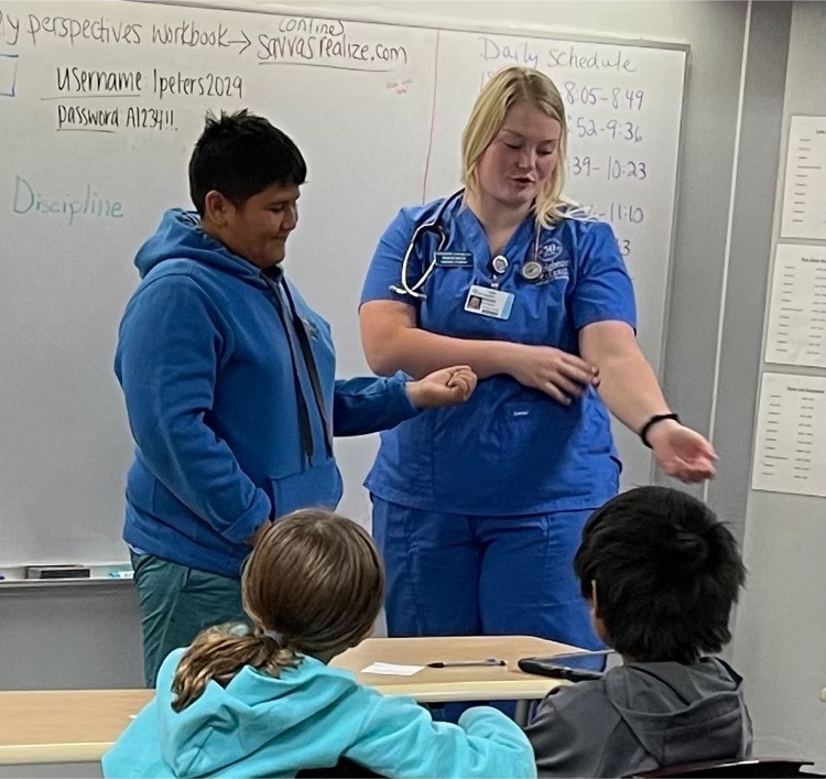 Kenzie discussing different ways to take your pulse and what a healthy rate is. 
