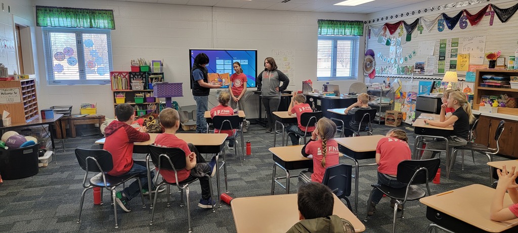 6th grade students reading to K-5 classrooms.