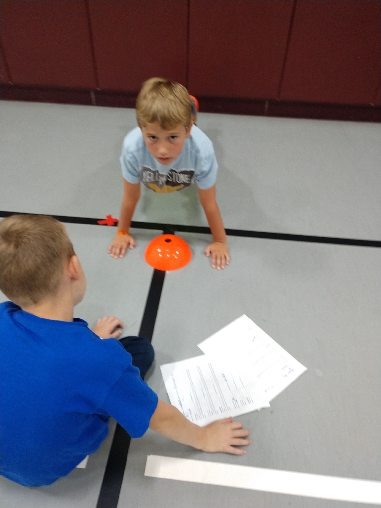 3rd graders working on their fitness testing in PE.