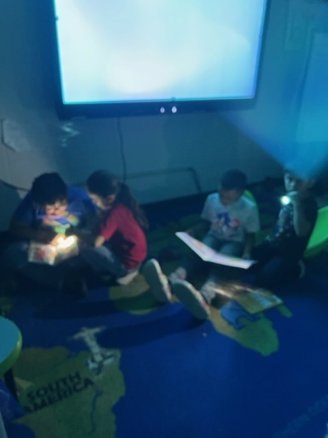 mrs lewis class reads in dark