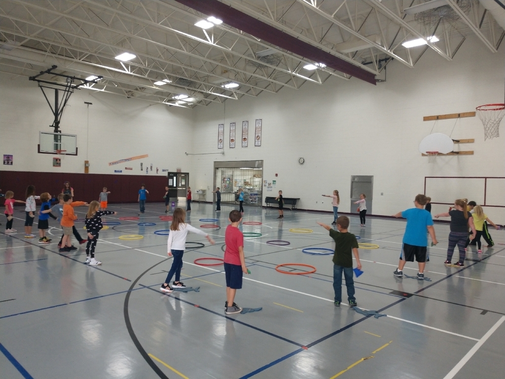 1st and 2nd graders worked on underhand throw and locomotor skills today in PE.