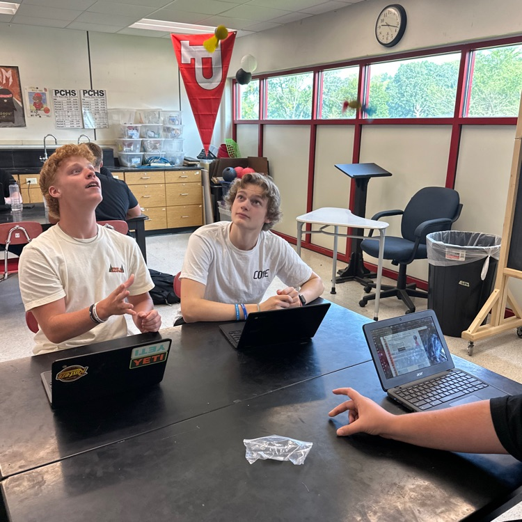 physics students learning about data collection with actual instrumentation 