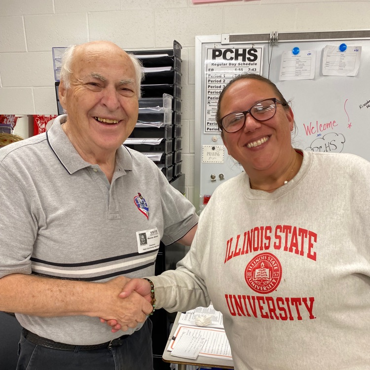 Fred Altman chats with PCHS Personal Development , Government and History teacher, Ms. Cosentine.