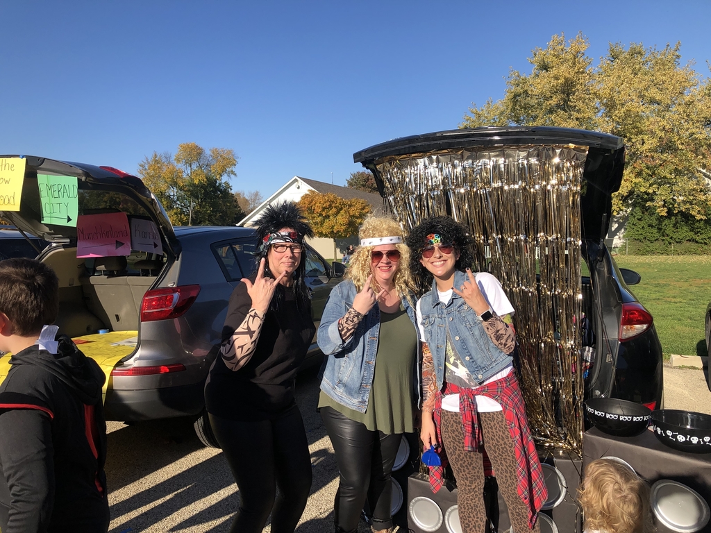 Mrs. Tibbs, Mrs. Gray and Mrs. Estes rockin’ out at the Trunk or Treat event.