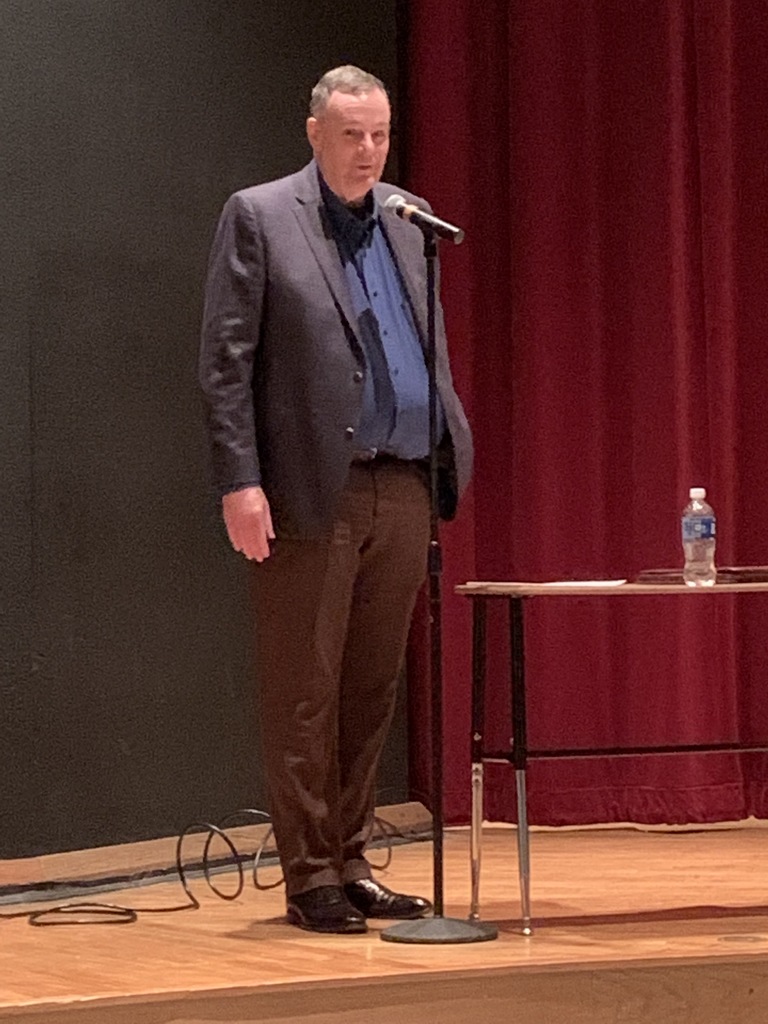 Mr. Paul McGinnis speaks to seniors