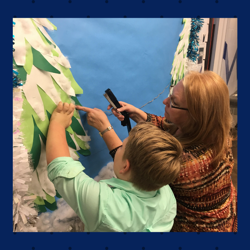 Mrs. Rita had a great helper to get in the holiday spirit! Good job!
