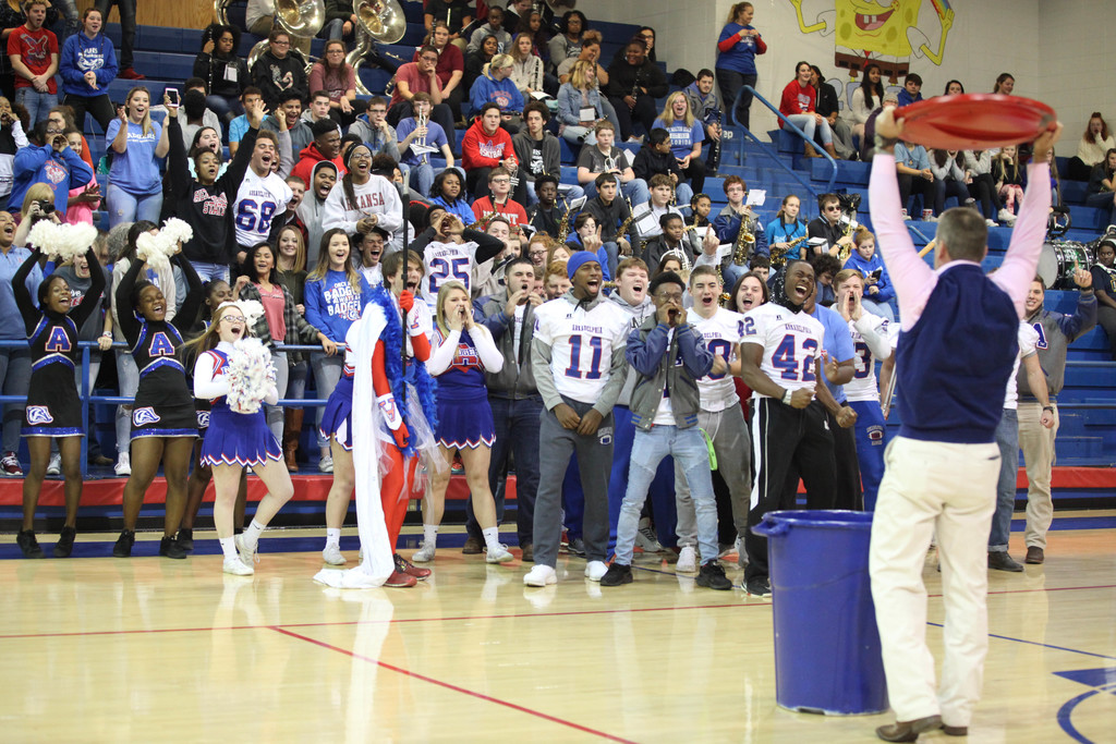 students screaming at pep rally