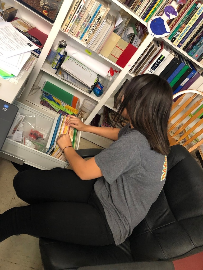 Nayeli Lopez working in a classroom.