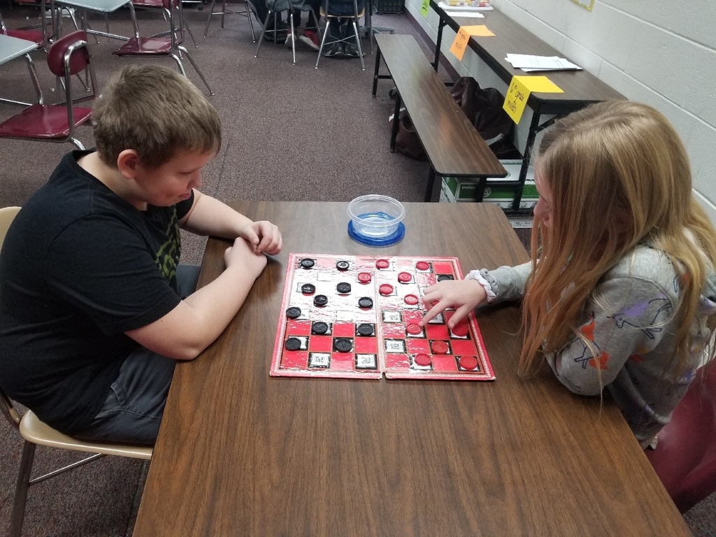 A serious game of checkers in the 6th grade! #wolverineslead