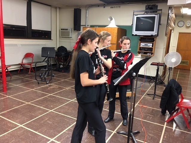 Saukettes working double duty in pep band.