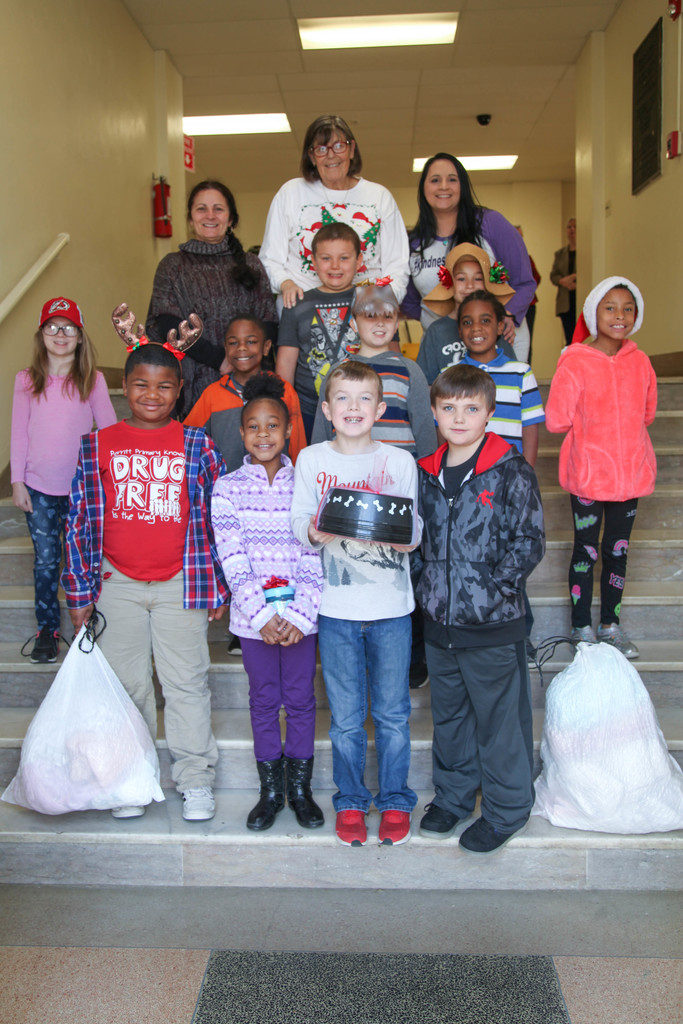 Central students present donation to humane society