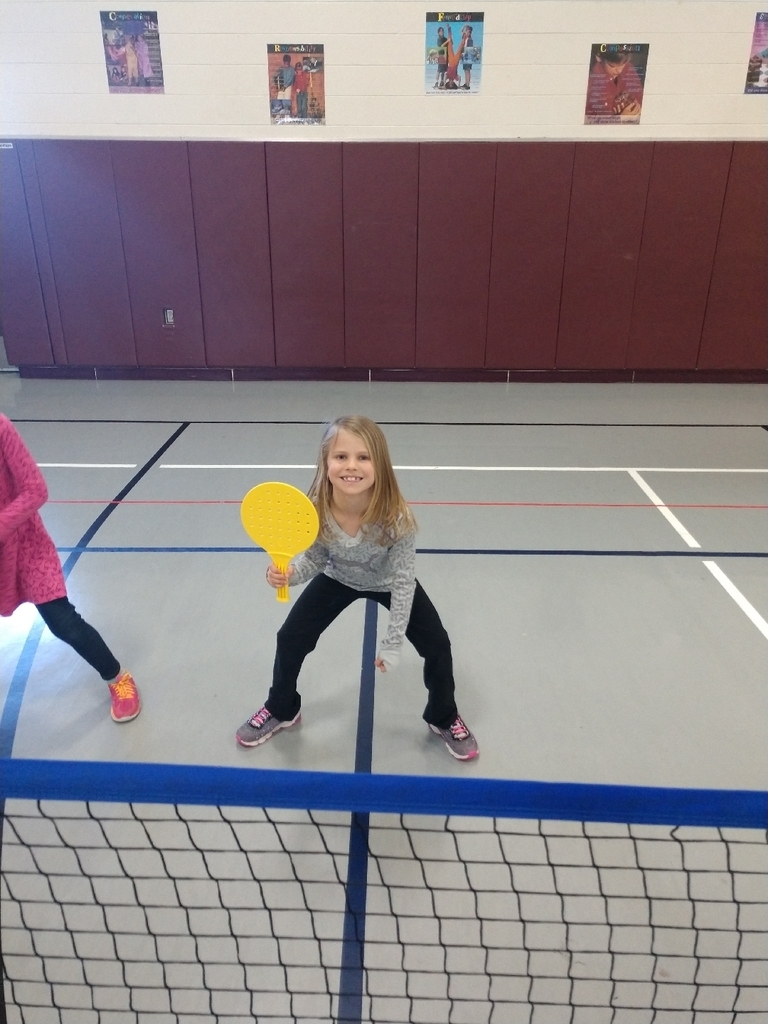 First graders worked on being in the ready/athletic position today while playing badminton.